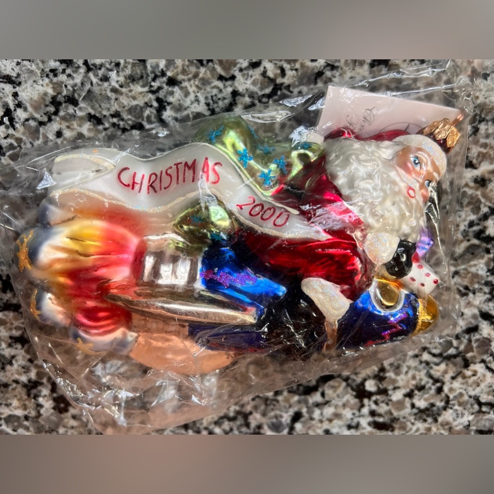Never opened, original bag - 2000 Christmas Radko 'Millennium Blastoff' Santa.